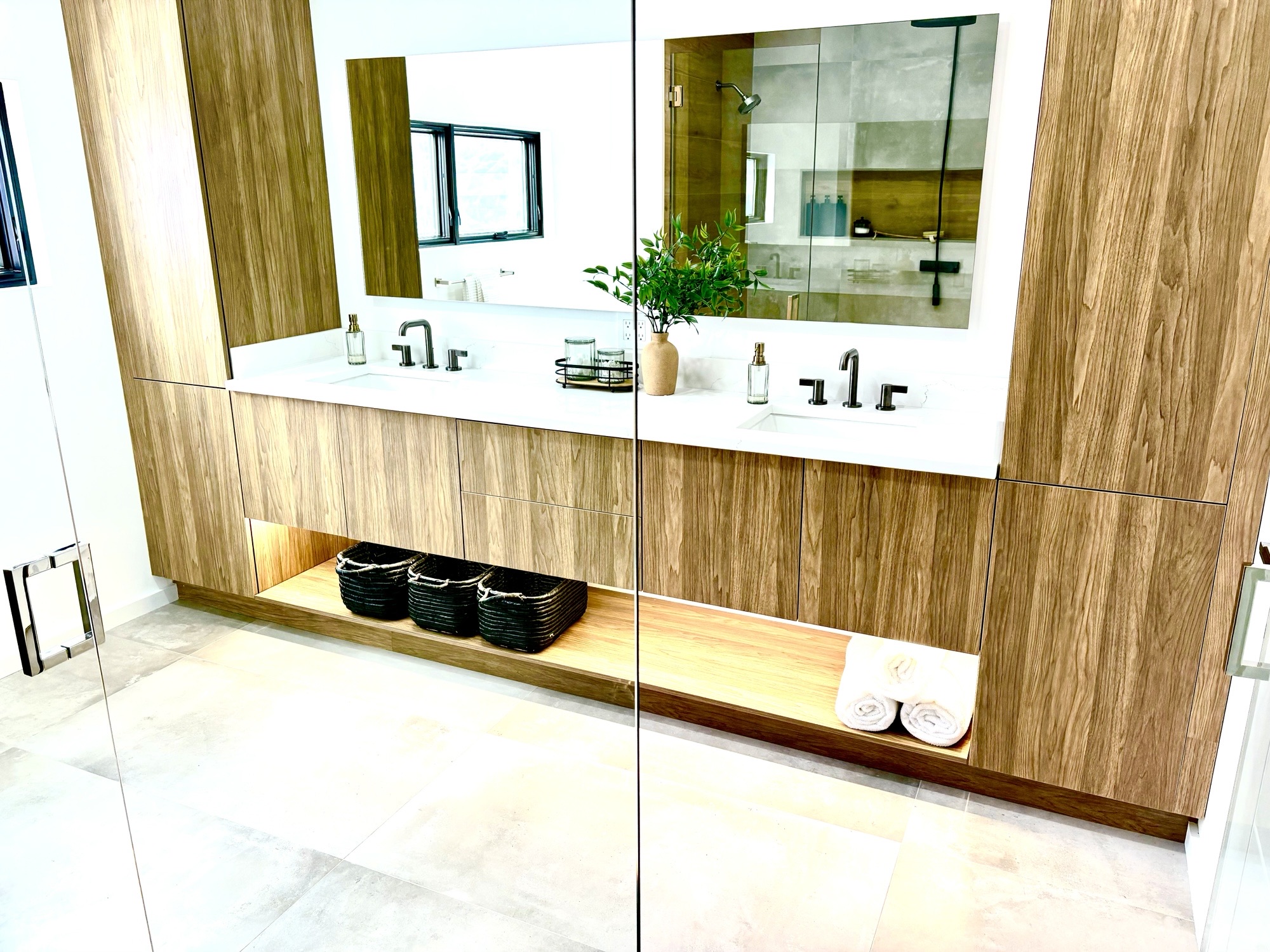 Wood cabinets and white countertop.